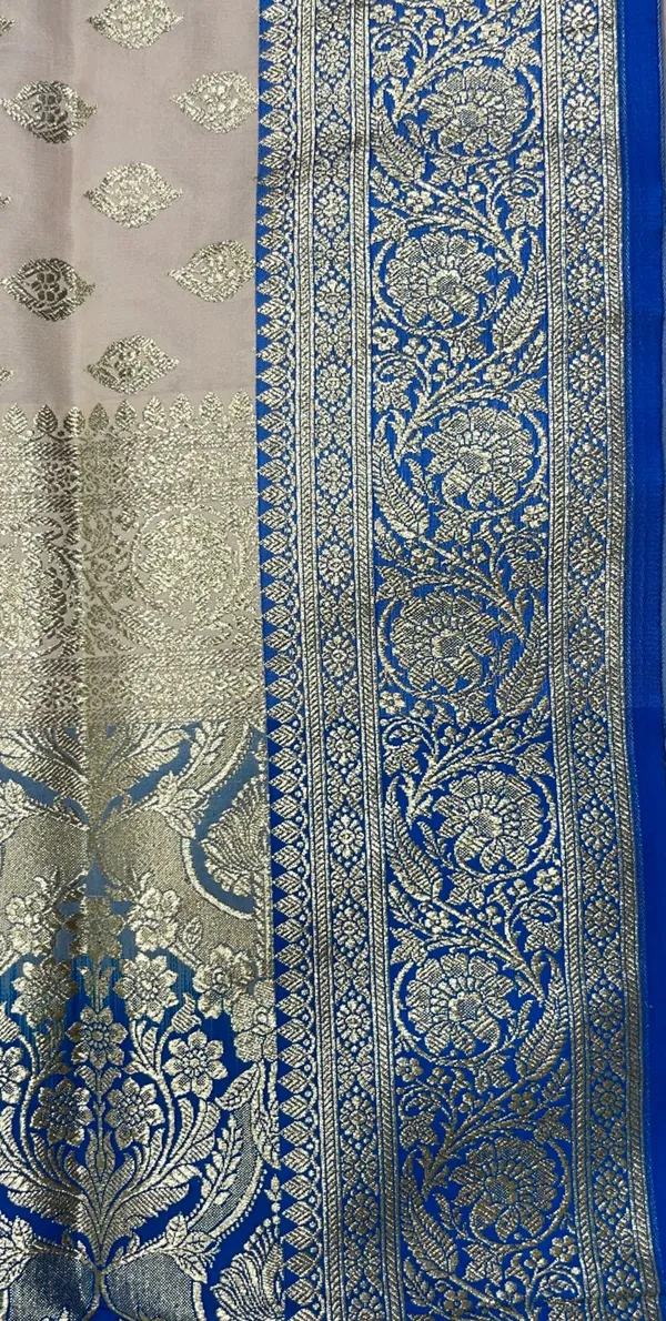 Humairah_Presents_Off-white_Katan_Silk_Floral_Light_Gold_Zari_Booti_with_Contrast_SkyBlue_Floral_Pallu_Banarasi_saree_and_Sky_Blue_Blouse