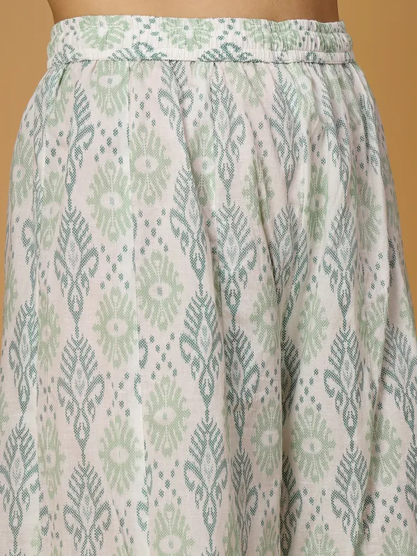 Green_Cotton_Solid_Kurta_With_Printed_Flair_Palazzo_Bottom_Set