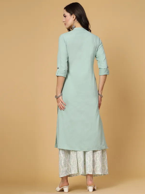 Green_Cotton_Solid_Kurta_With_Printed_Flair_Palazzo_Bottom_Set