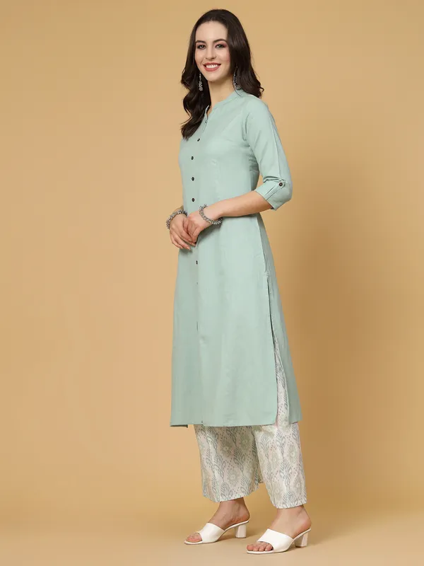 Green_Cotton_Solid_Kurta_With_Printed_Flair_Palazzo_Bottom_Set
