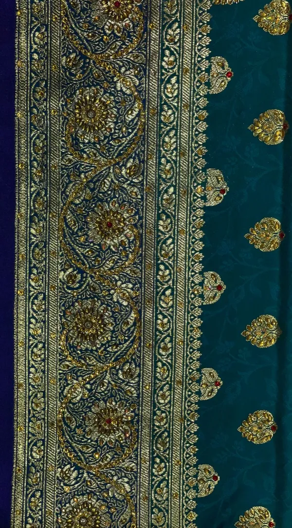 Humairah_Presents_Turqouise_Blue_Stone_Work_Golden_Zari_Booti_Afli_Mina_Jaal_with_Alfi_Boota_Pallu_Zari_Border_and_Blue_Blouse_Banarasi_Saree