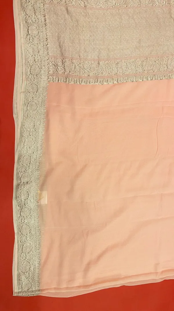 Humairah_Pure_Handwoven_Peach_Plain_Khaddi_Georgette_Silver_Zari_Kadhwa_Border_and_Anchal_with_Peach_Blouse_Banarasi_Saree