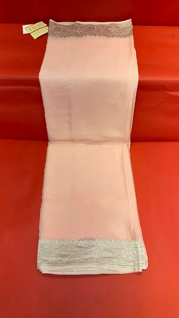 Humairah_Pure_Handwoven_Peach_Plain_Khaddi_Georgette_Silver_Zari_Kadhwa_Border_and_Anchal_with_Peach_Blouse_Banarasi_Saree