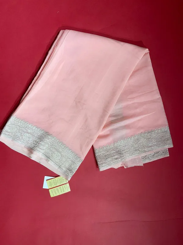 Humairah_Pure_Handwoven_Peach_Plain_Khaddi_Georgette_Silver_Zari_Kadhwa_Border_and_Anchal_with_Peach_Blouse_Banarasi_Saree
