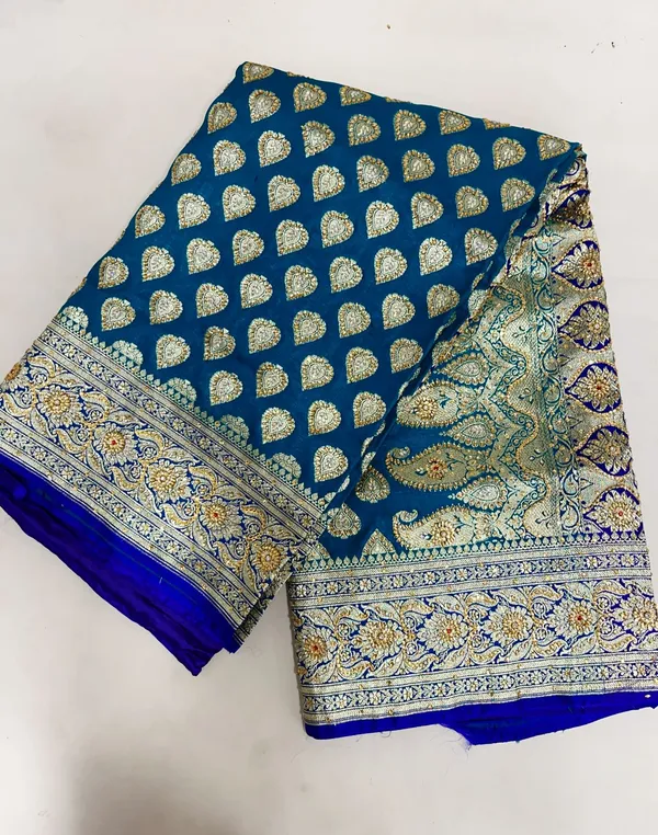 Humairah_Presents_Green_Stone_Work_Golden_Zari_Boota_with_Contrast_Blue_Pallu_Zari_Border_and_Blue_Blouse_Banarasi_Saree