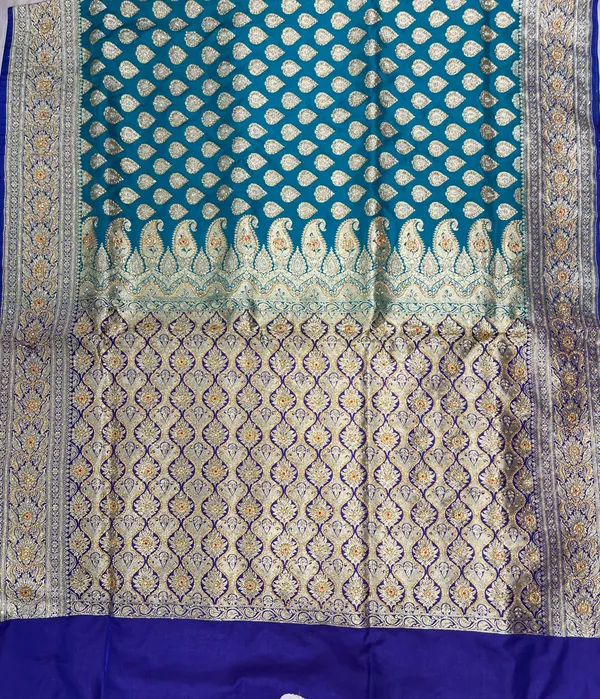 Humairah_Presents_Green_Stone_Work_Golden_Zari_Boota_with_Contrast_Blue_Pallu_Zari_Border_and_Blue_Blouse_Banarasi_Saree