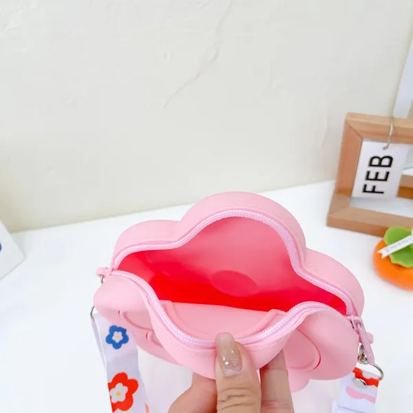 Pink_Floral_Silicon_Sling_Bag_With_Mirror,_Comb,_Hair_Clip,_And_Key_Chain