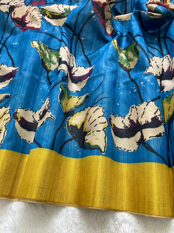 Saraswati_Blue_–_Divine_Wisdom_Navratri_Special_|_Soft_Tussar_Silk_Saree_with_Print,_Border_&_Contrast_Print_Blouse_with_Tassels