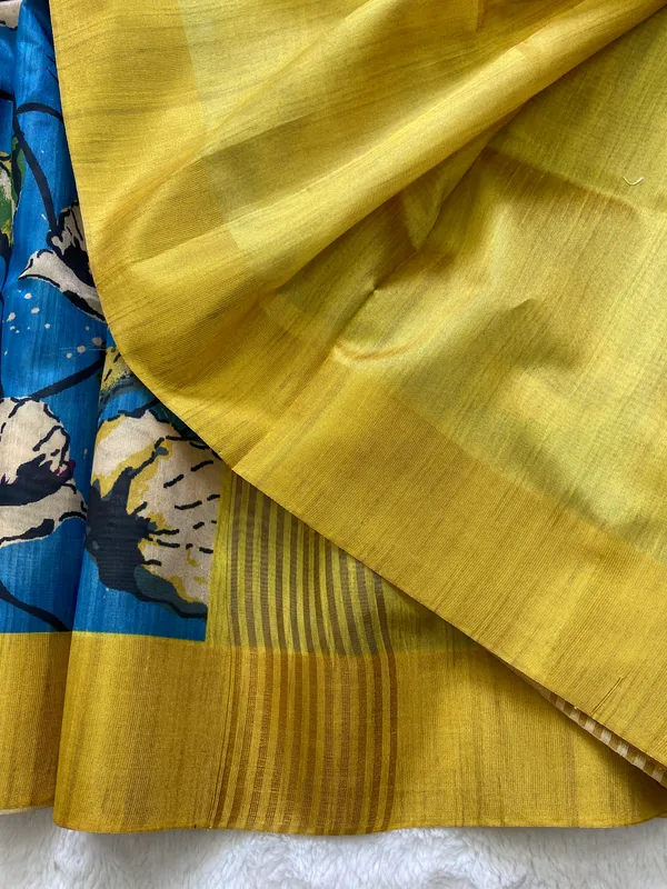 Saraswati_Blue_–_Divine_Wisdom_Navratri_Special_|_Soft_Tussar_Silk_Saree_with_Print,_Border_&_Contrast_Print_Blouse_with_Tassels