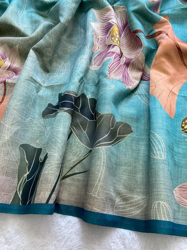 Damini_Sky_Blue_–_Dazzling_Navratri_Special_|_Soft_Tussar_Silk_Saree_with_Print,_Border_&_Contrast_Print_Blouse_with_Tassels