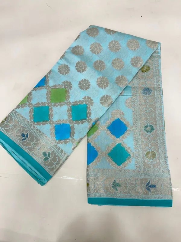 Humairah_Pure_Handloom_Light_Blue_Cotton_Silk_Zari_Booti_with_Rangkaat_Banarasi_Zari_Hand_Painted_Floral_Pallu_and_Zari_Border_with_Light_Blue_Blouse