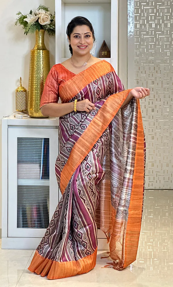 Barkha_Orange_&_Wine_–_Monsoon_Fresh_Diwali_Special_|_Soft_Tussar_Silk_Saree_with_Print,_Pallu_&_Zari_Border_&_Contrast_Print_Blouse_with_Tassels