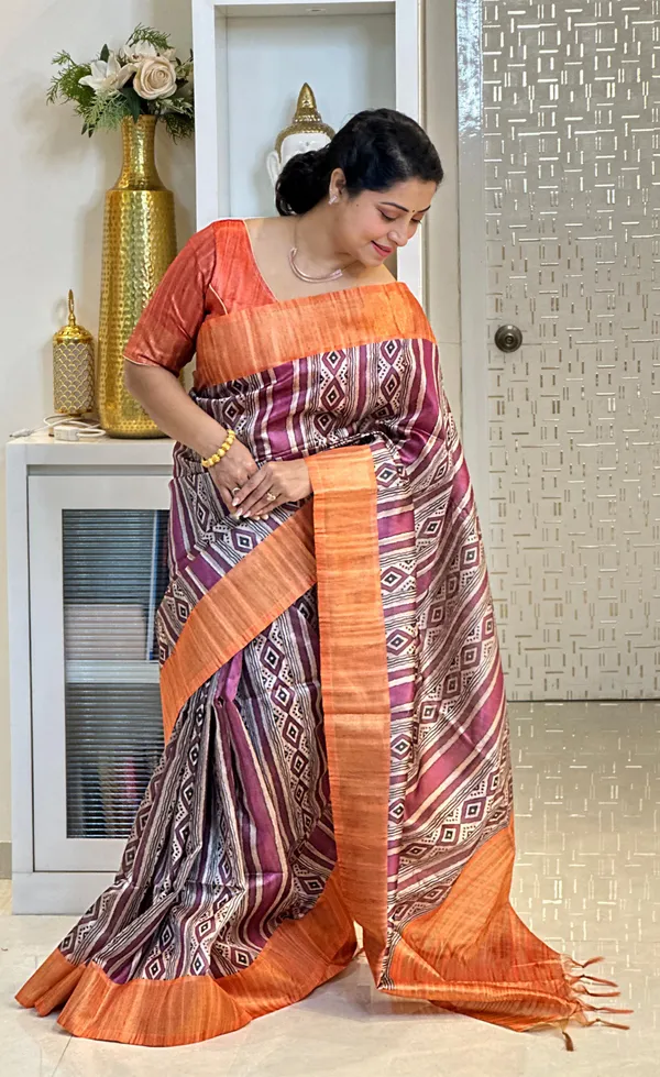 Barkha_Orange_&_Wine_–_Monsoon_Fresh_Diwali_Special_|_Soft_Tussar_Silk_Saree_with_Print,_Pallu_&_Zari_Border_&_Contrast_Print_Blouse_with_Tassels