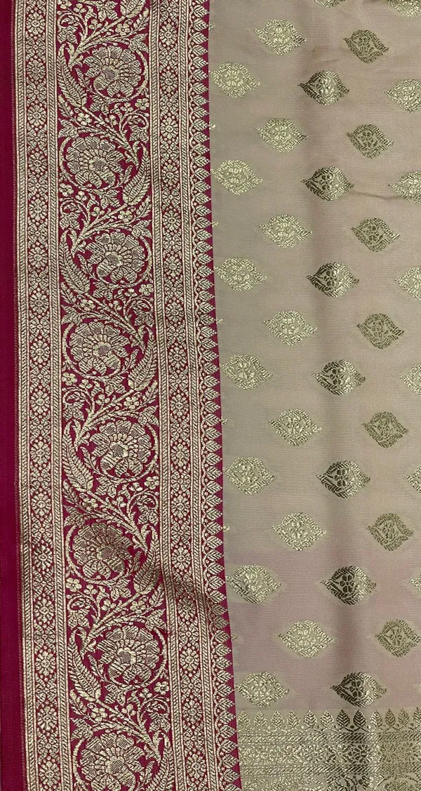 Humairah_Presents_Off-White_Katan_Silk_Floral_Light_Gold_Zari_Booti_with_Contrast_Magenta_Floral_Pallu_Banarasi_saree_and_Magenta_Blouse