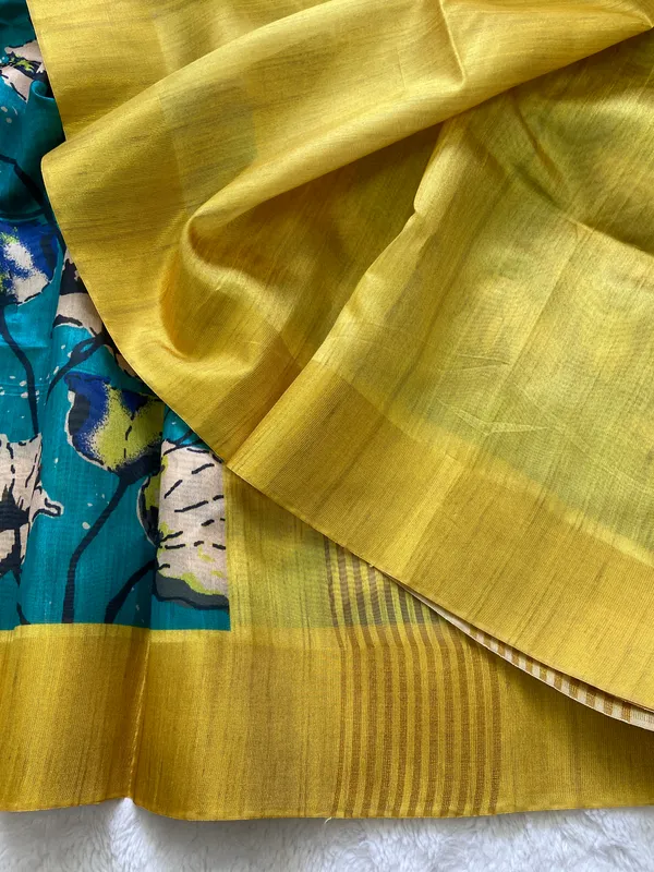 Saraswati_Rama_Green_–_Divine_Wisdom_Navratri_Special_|_Soft_Tussar_Silk_Saree_with_Print,_Border_&_Contrast_Print_Blouse_with_Tassels