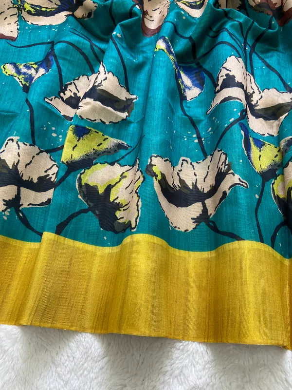 Saraswati_Rama_Green_–_Divine_Wisdom_Navratri_Special_|_Soft_Tussar_Silk_Saree_with_Print,_Border_&_Contrast_Print_Blouse_with_Tassels