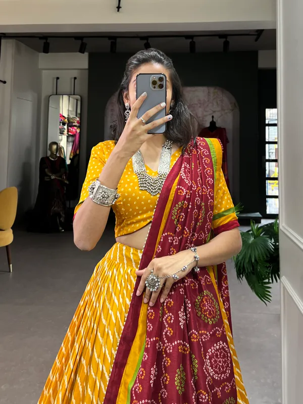 Yellow_Color_Leheriya_With_Patola_Print_Tussar_Silk_Lehenga_Choli