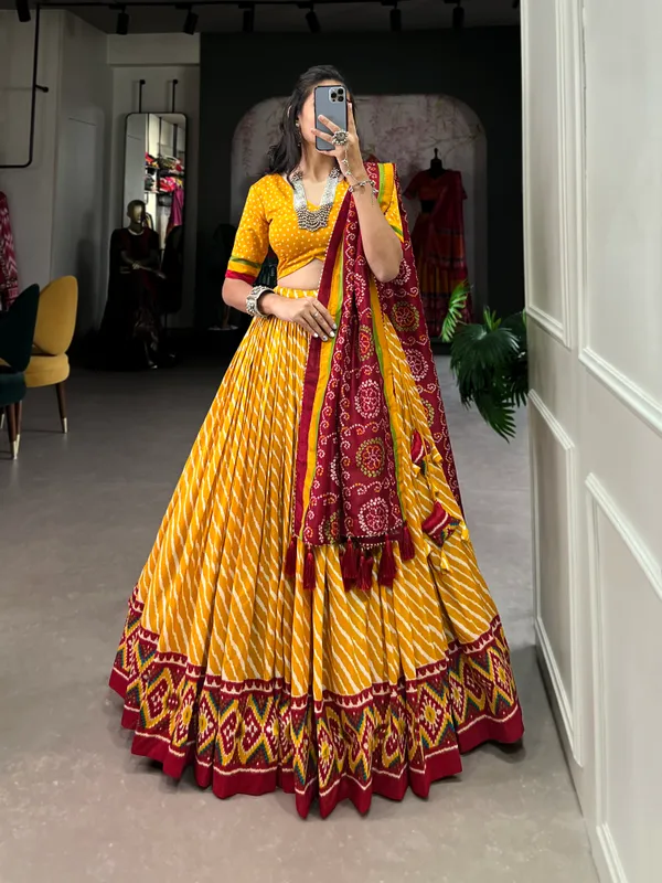 Yellow_Color_Leheriya_With_Patola_Print_Tussar_Silk_Lehenga_Choli