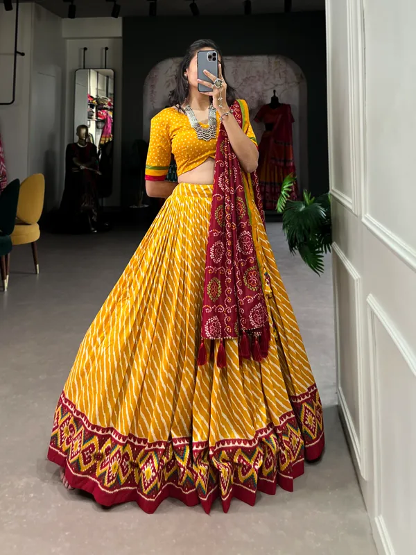 Yellow_Color_Leheriya_With_Patola_Print_Tussar_Silk_Lehenga_Choli