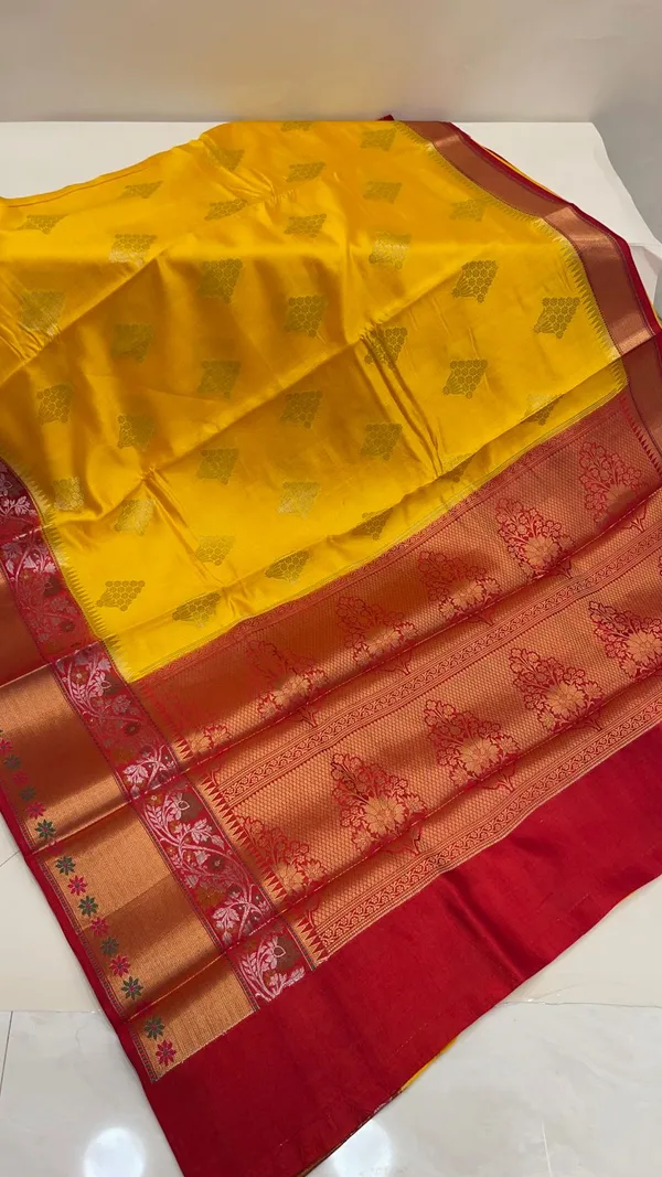 Humairah_Pure_Handloom_Yellow_Chiniya_Silk_Golden_Floral_Zari_Booti_Contrast_Maroon_Skirt_Silver_Mina_Zari_Dual_Border_and_Maroon_Floral_Boota_Pallu_with_Maroon_Blouse