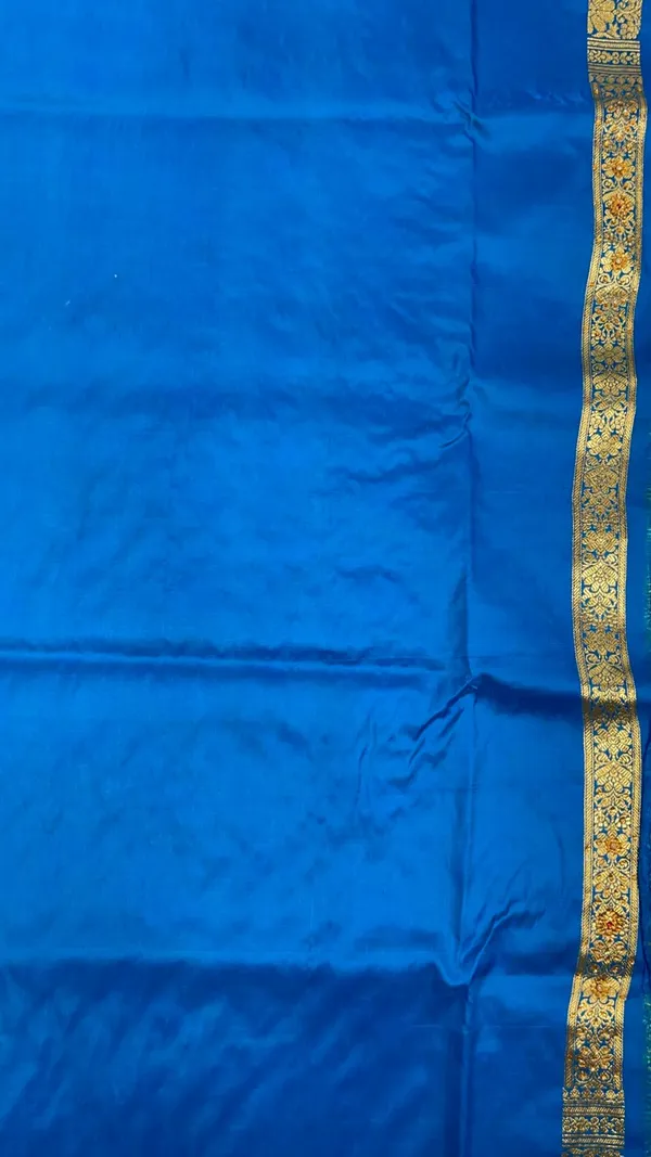 Humairah_Presents_Turqouise_Blue_Stone_Work_Golden_Zari_Booti_Jaal_with_Paisely_Boota_Pallu_Zari_Border_Banarasi_Saree