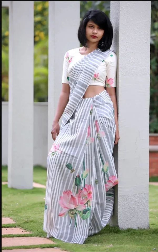 https://d1311wbk6unapo.cloudfront.net/NushopCatalogue/tr:f-webp,w-600,fo-auto/undefined_1690628423585_gj4uwztk184o6ig.jpg__INDIAN LINEN SAREE