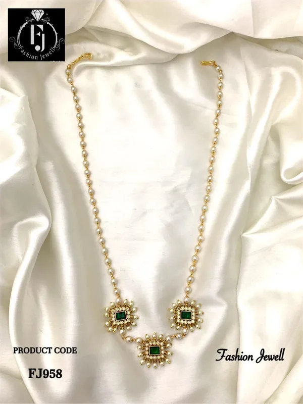 Bani_Statement_Ad_With_Pearl_Necklace