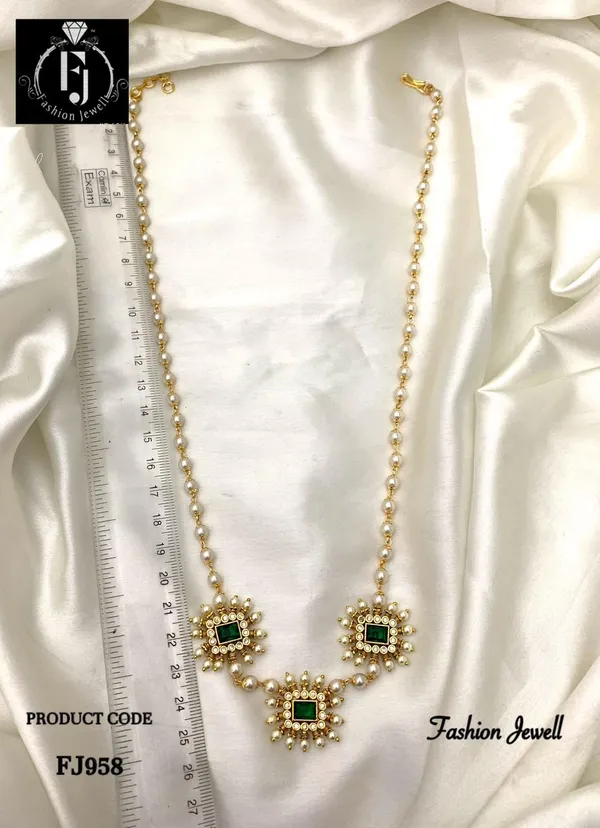 Bani_Statement_Ad_With_Pearl_Necklace