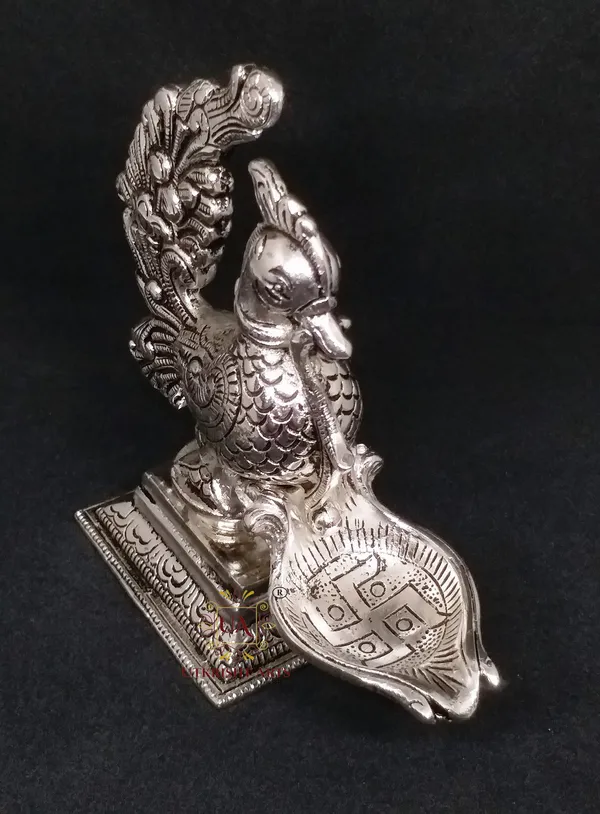 Silver_Plated_Metal_Peacock_Design_Annapakshi_Deepam_Oil_lamp_for_Temple_,_Office_&_Home_Decor_Decorative_Showpiece_-_14.5_cm_(Metal,_Silver)