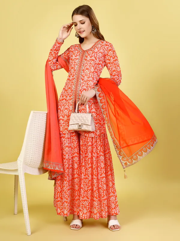 Vibrant_Tomato_Red_Printed_Jacket-Gharara-Dupatta_Set