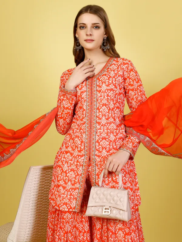 Vibrant_Tomato_Red_Printed_Jacket-Gharara-Dupatta_Set