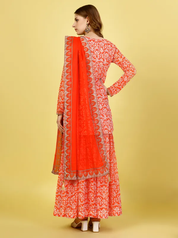 Vibrant_Tomato_Red_Printed_Jacket-Gharara-Dupatta_Set