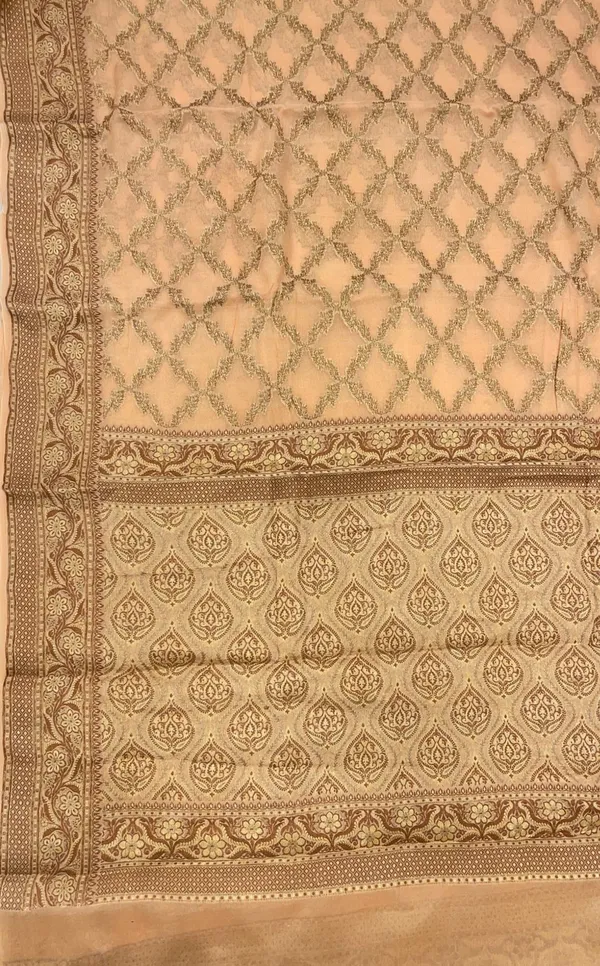 Humairah_Presents_Pure_Handwoven_Cream_Chiffon_Kadiyal_Copper_Zari_Jaal_and_Resham_Mina_Zari_Boota_Pallu_with_Cream_Blouse