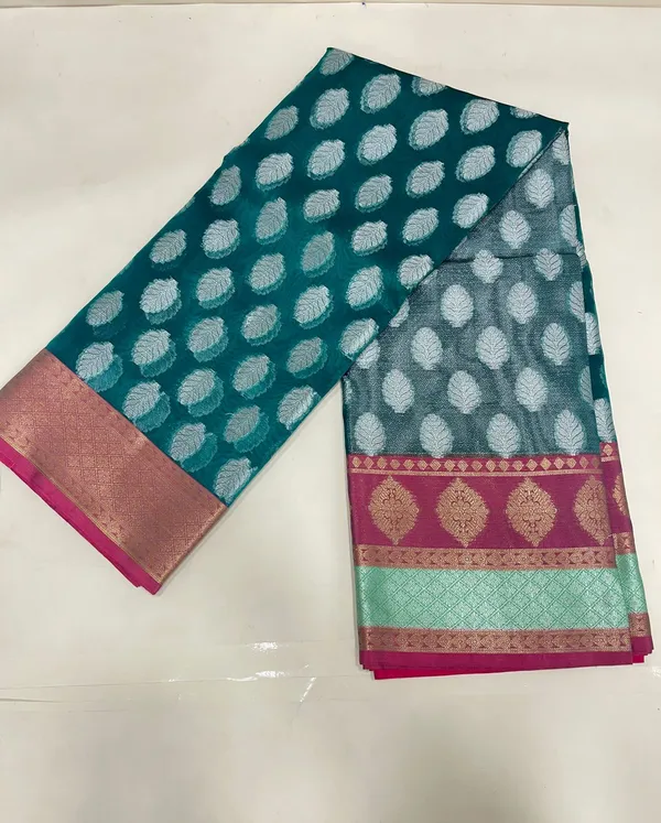 Humairah_Presents_Green_Organza_Silver_Zari_Floral_Booti_with_Contrast_Light_Purple_Floral_Booti_Pallu_and_Skirt_Zari_2D_Border_with_Light_Purple_Blouse