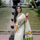 Off White And Green__Zari and Saree