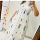 White__Dhanlaxmi Textile 