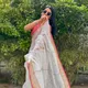 Natural Off-White / Ivory base with metallic gold zari and gulabi pink__Akshya Marketing And Consulting