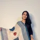 Natural Off-White Base with Indigo Blue Stripes, Rust Red Accents, and Deep Blue Motifs__Akshya Mraketing And Consulting