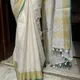 Off-white / Cream with Golden Zari__Akshya Marketing And Consulting