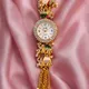 Gold-plated chain bracelet adorned with decorative elephant charms, pearls, and colorful beads__kamakshee By Jaya