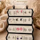 Silver Toned With Pink, Black, Blue, White, And Green Enamel Accents__AMBELIS