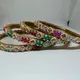Multicolour (Red, Green, Pink, White, Gold-tone)