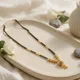 Black & Gold Tone