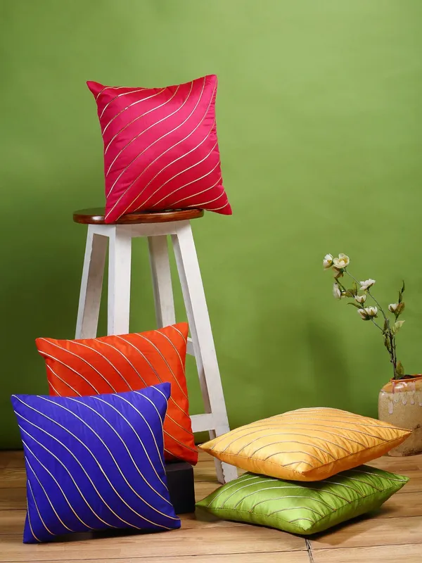 https://d1311wbk6unapo.cloudfront.net/NushopCatalogue/tr:w-600,f-webp,fo-auto/Gifts_Island®_Set_of_5_Polyester_Silk_Multicolor___Gold-Tone_Wave_Striped_Square_Cushion_Covers_16_inch_x_16_inch__40.64_x_40.64_cm__Multicolor__Y9HAN46EPE_2022-08-22_1.jpg